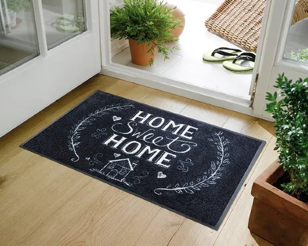 Wycieraczka wejściowa z napisem 75 x 50 cm Home - aranżacja przed drzwiami