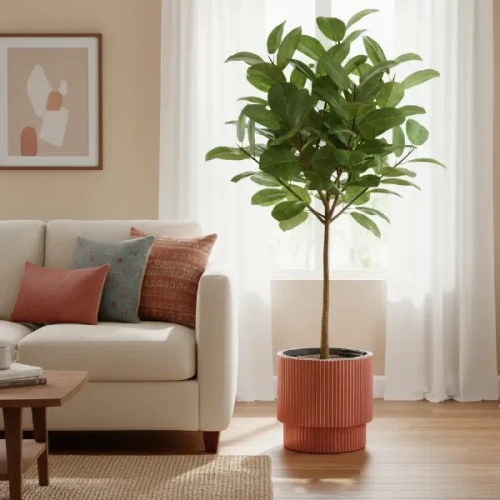 Doniczka Milly Prosperplast 40cm w kolorze miedzianym stojąca w salonie