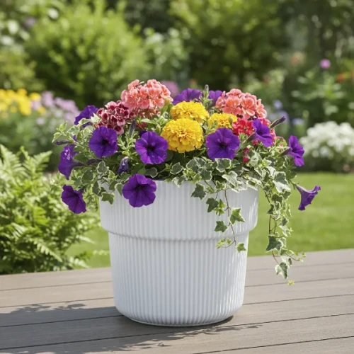 Biała donica Milly Prosperplast 40cm stojąca na tarasie