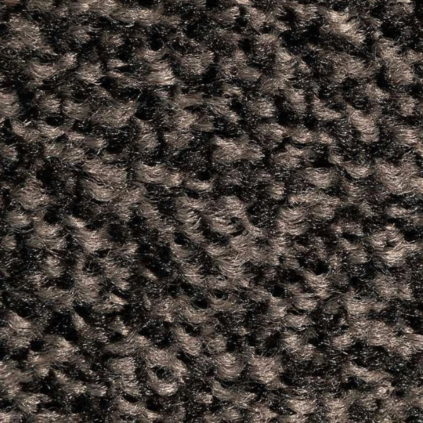 Detale warstwy użytkowej wycieraczki obiektowej Strongmata ukazujące melanżowy splot czarnych i brązowych włókien High-Twist Nylon o strukturze szczotki.