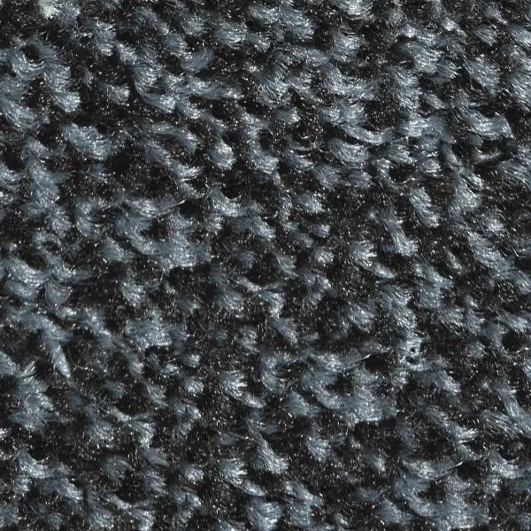 Zbliżenie na grafitowe runo wycieraczki wejściowej Strongmata 150x400 cm złożone z szarych i czarnych włókien High-Twist Nylon.