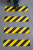 deptanie-po-tasmie-antyposlizgowej-czarno-zoltej.png